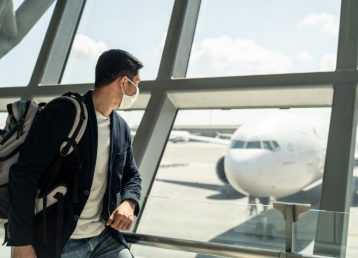 asian-traveler-business-man-wait-to-board-into-air-2022-01-19-00-17-15-utc (Medium)